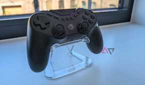 black gamesir controller resting on clear plastic stand