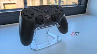 black gamesir controller resting on clear plastic stand