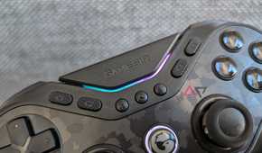 face buttons and blue and pink LEDs on black gamesir controller