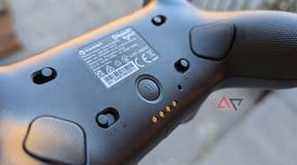back of black gamesir controller showing switches and triggers