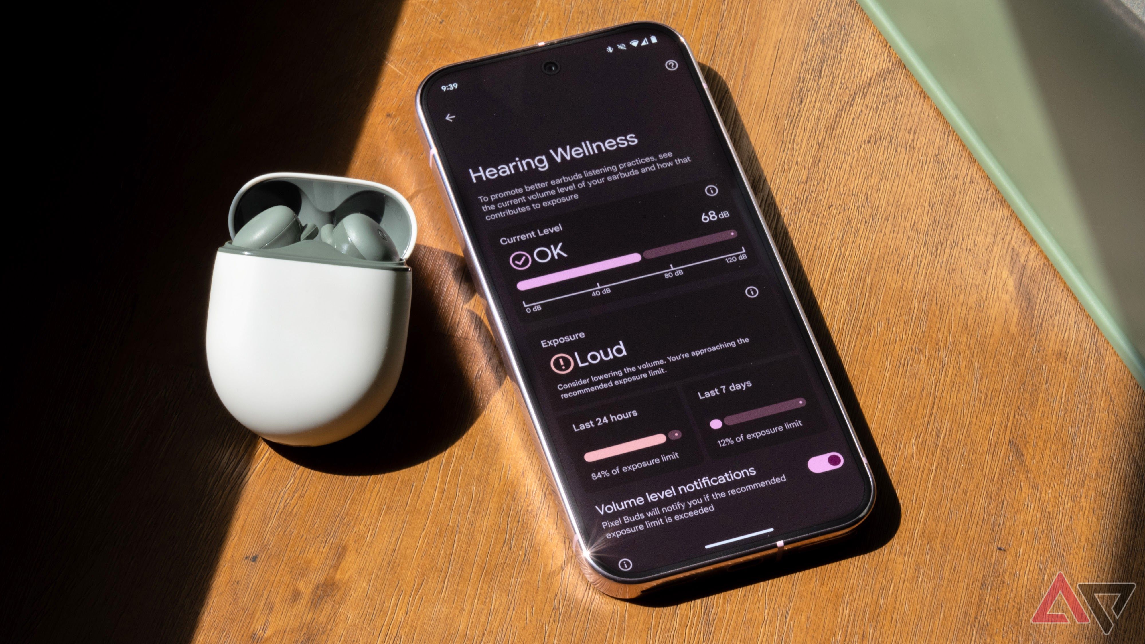Google Pixel Buds A-Series with Pixel 9 Pro displaying a Hearing Wellness application