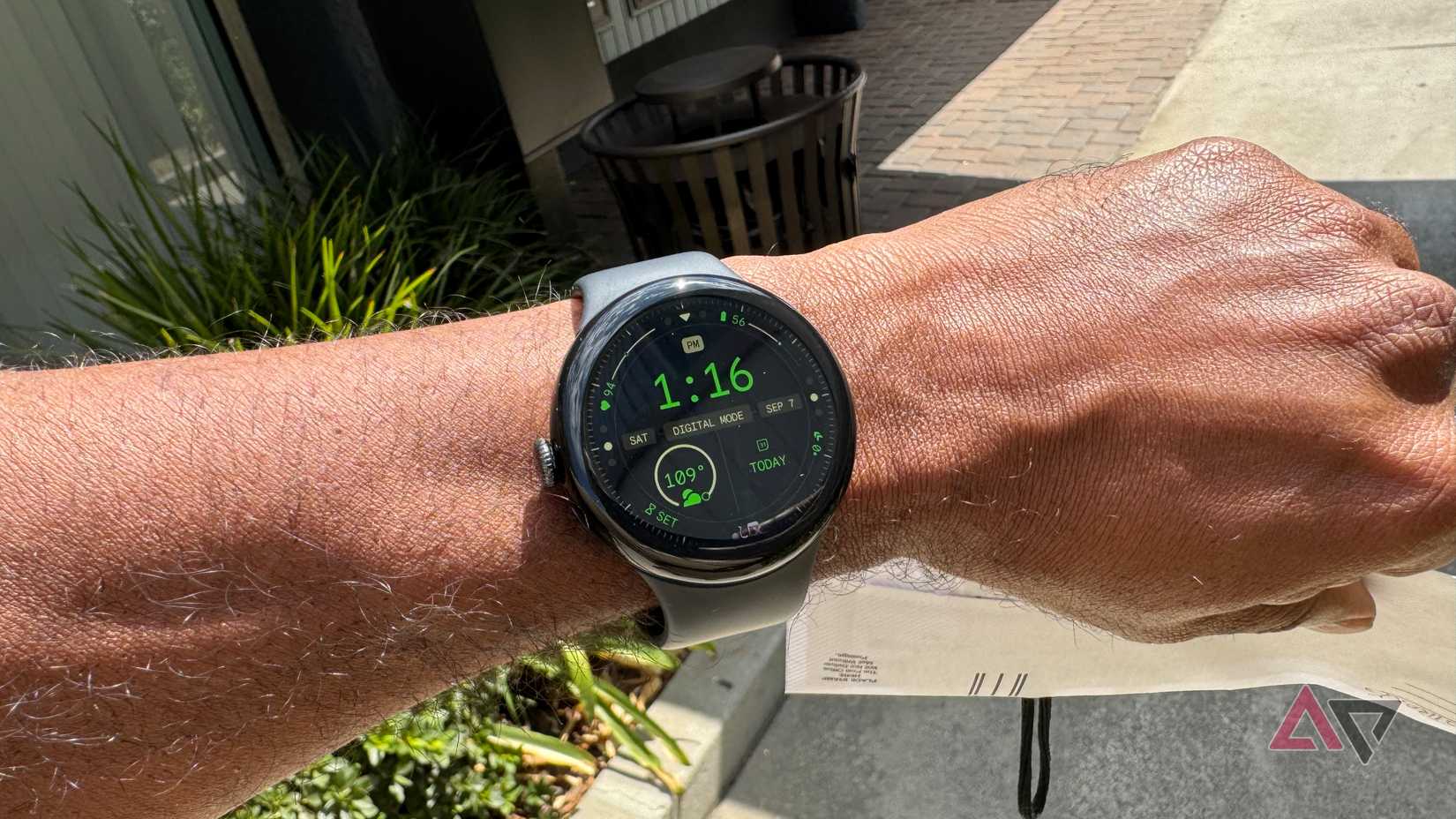 Google Pixel Watch 3 showing the Adventure watch face on a sunny day
