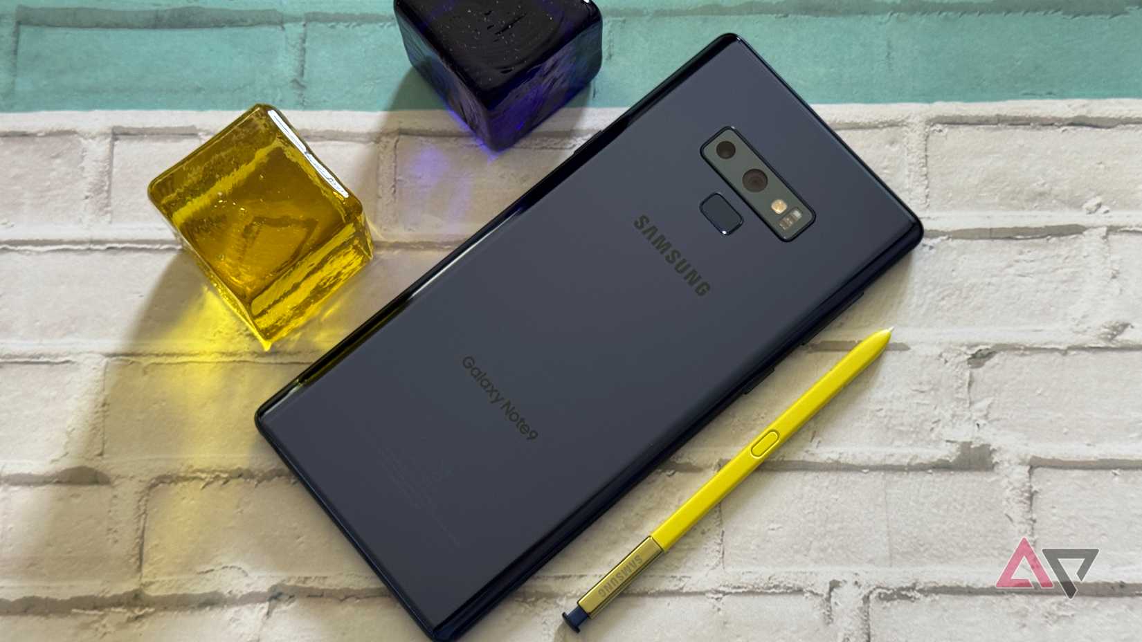 Samsung Galaxy Note 9 next to glass blocks