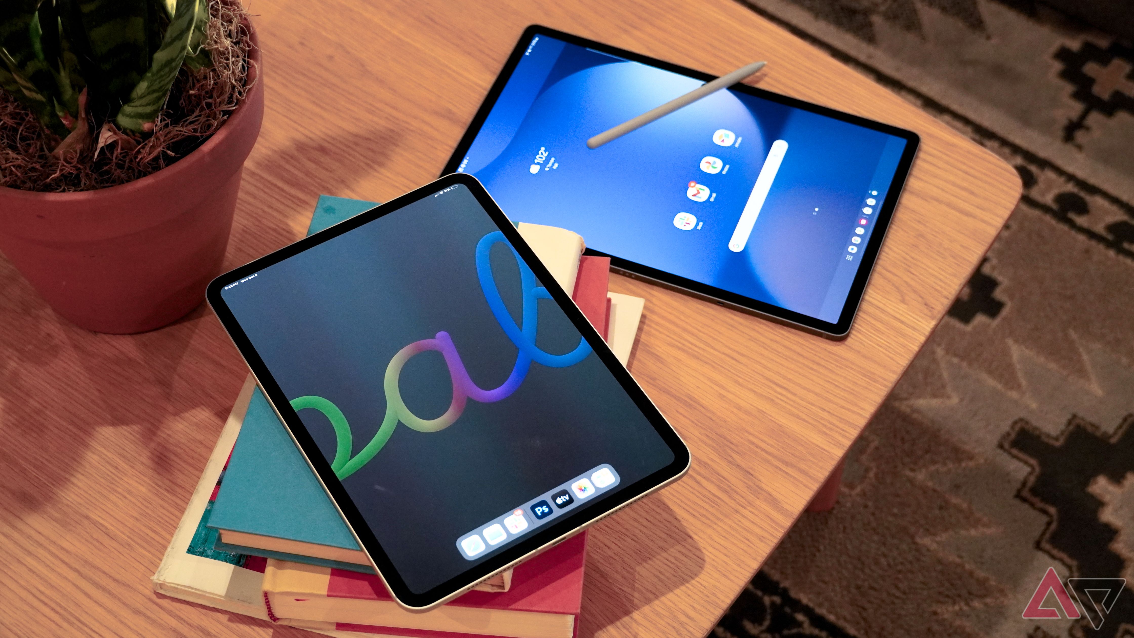 The iPad Pro M4 next to a Galaxy Tab S10+ with an S Pen.