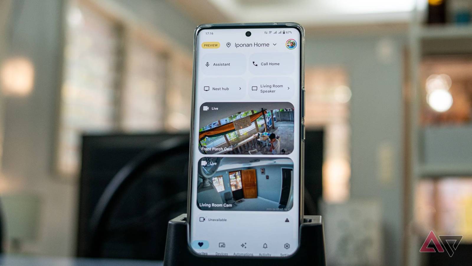 Google Home app favorites tab showing security camera feeds and other devices