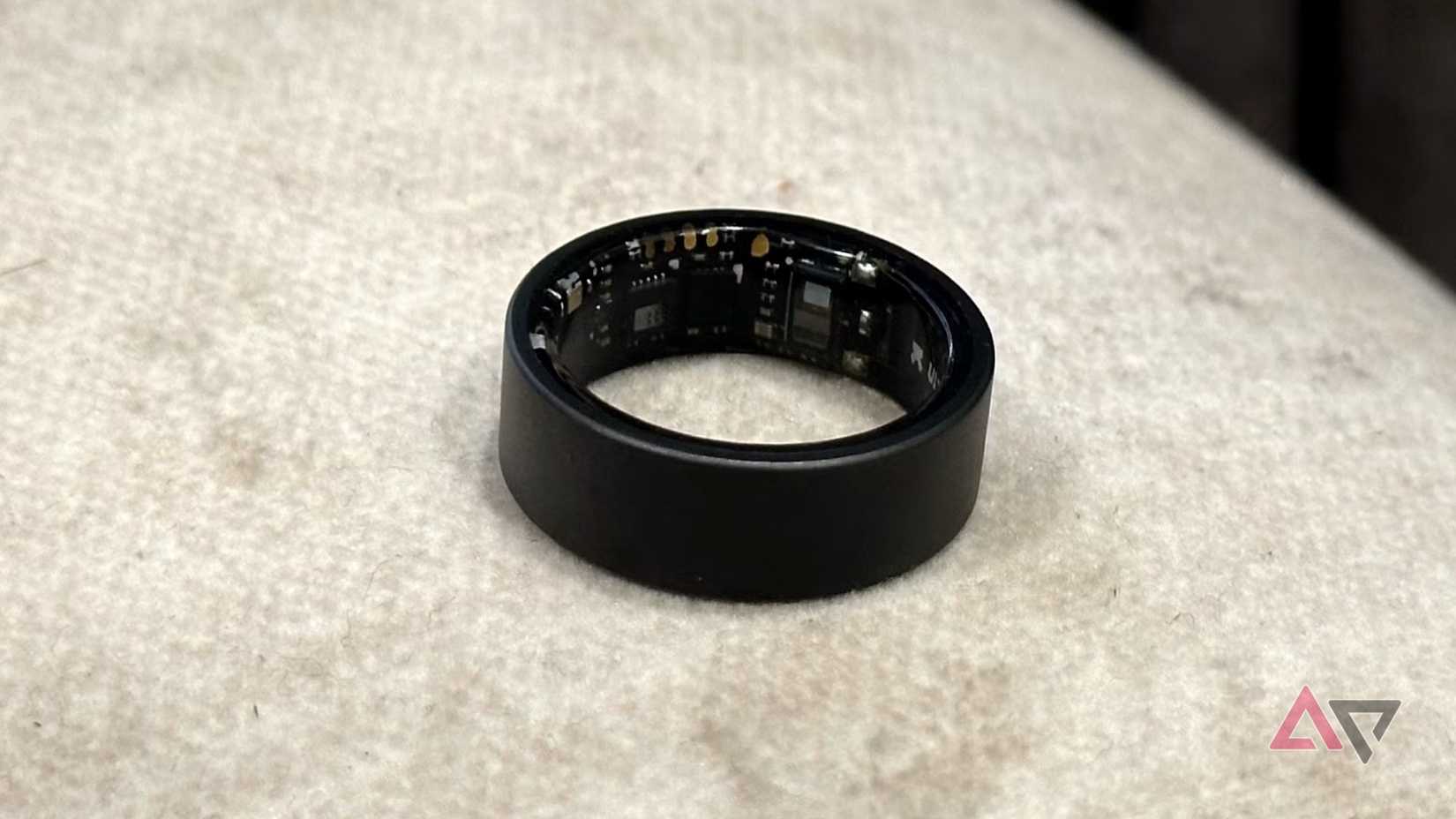 The Ultrahuman Ring Air, showing the sensors on the inner surface.