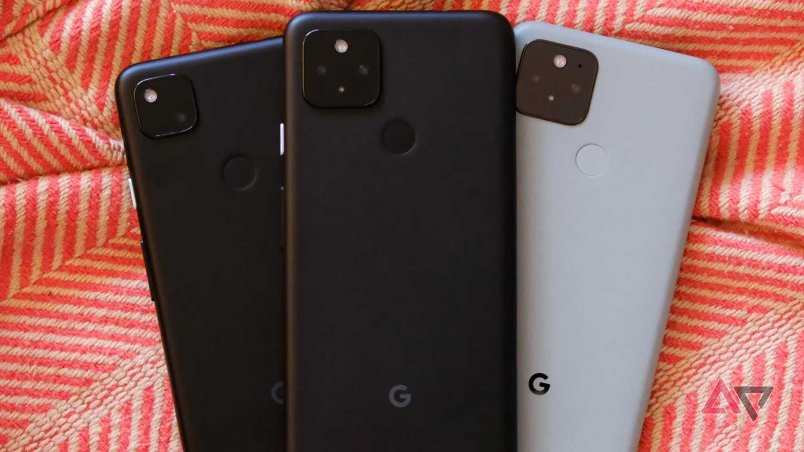 The Pixel 4a, 4a 5G, and 5a stacked together.