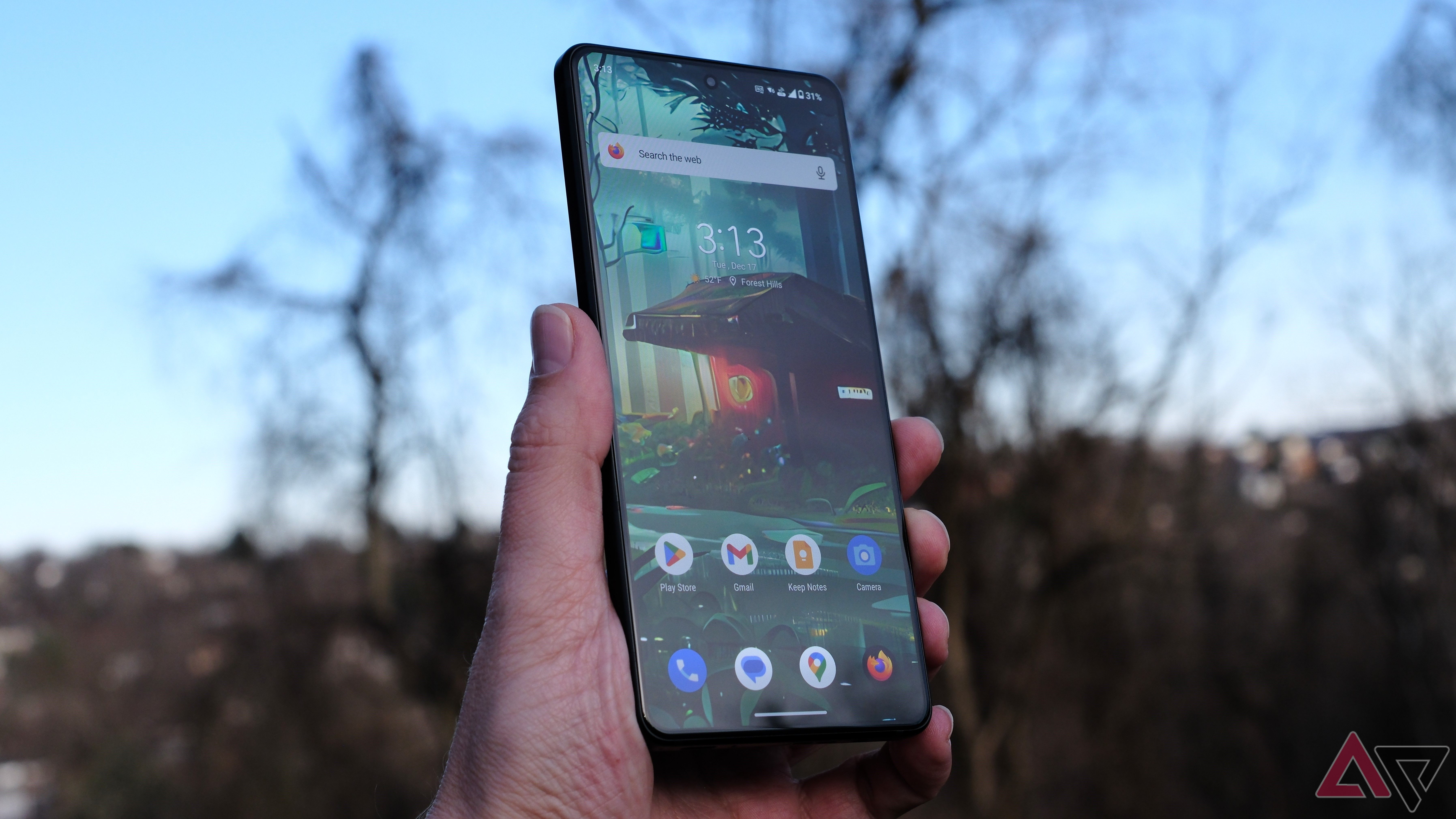 ROG Phone 9 Proheld in hand showing screen