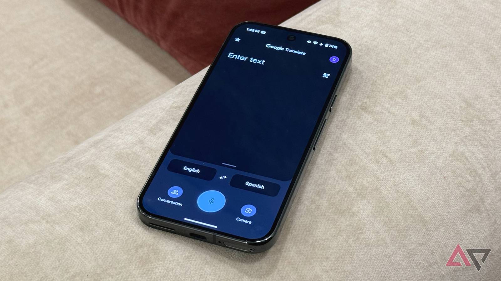 Google Translate app's home page with text, voice, and camera input options