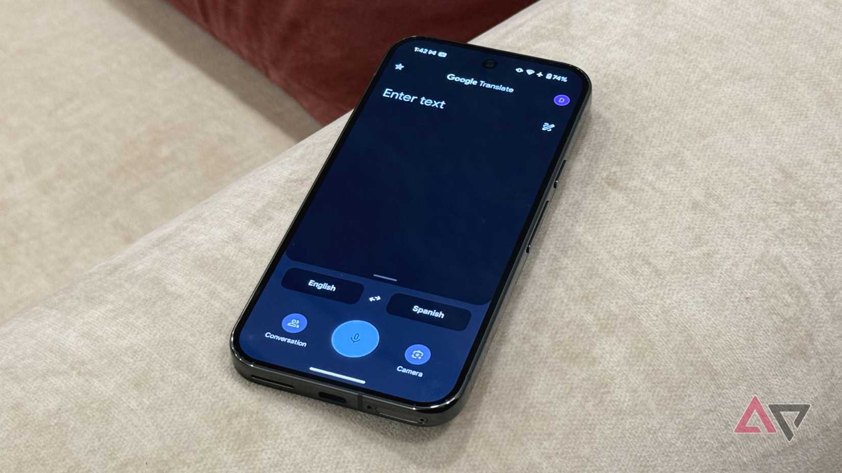 Google Translate app's home page with text, voice, and camera input options