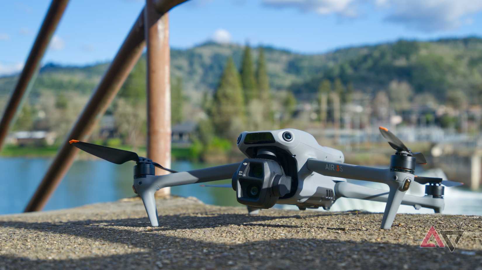 Dji Air 3s with the camera head confined to the side, overlooking the river below