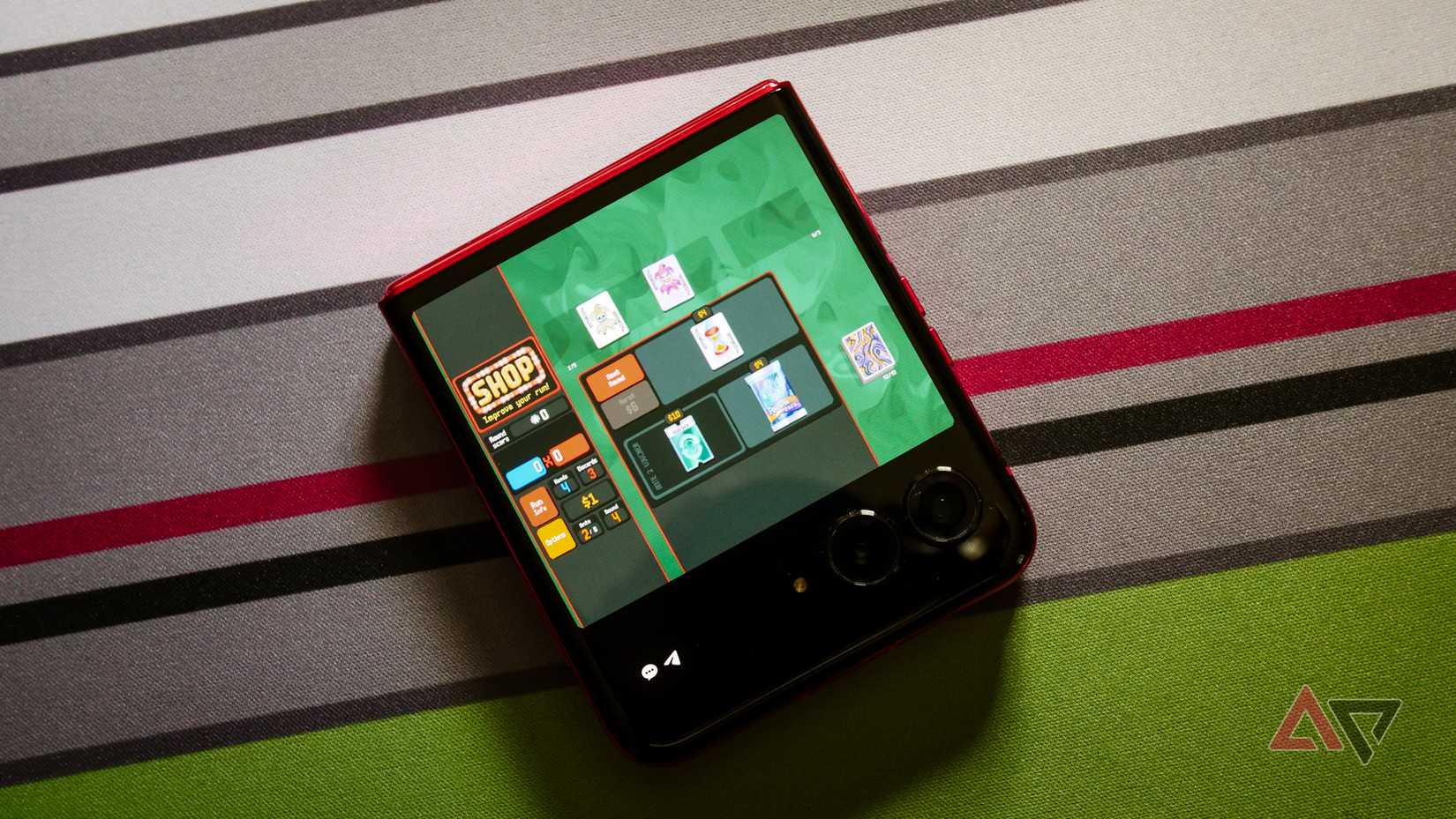 The Moto Razr+ 2024 with Balatro on the front screen