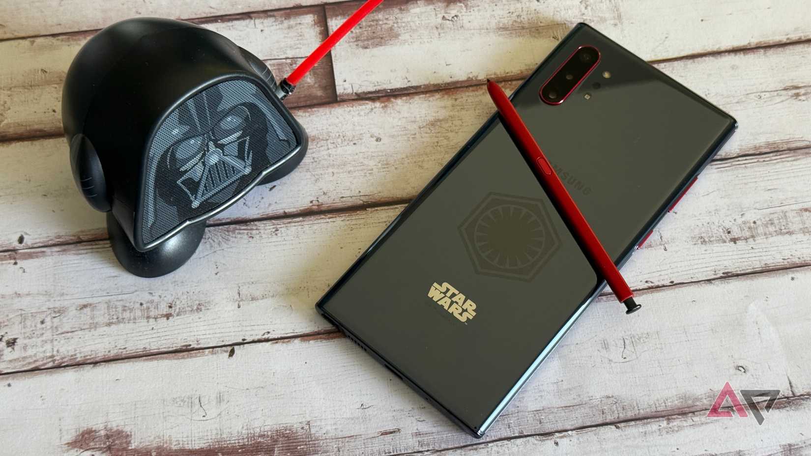 Samsung Galaxy Note 10+ sitting next to Darth Vader figure