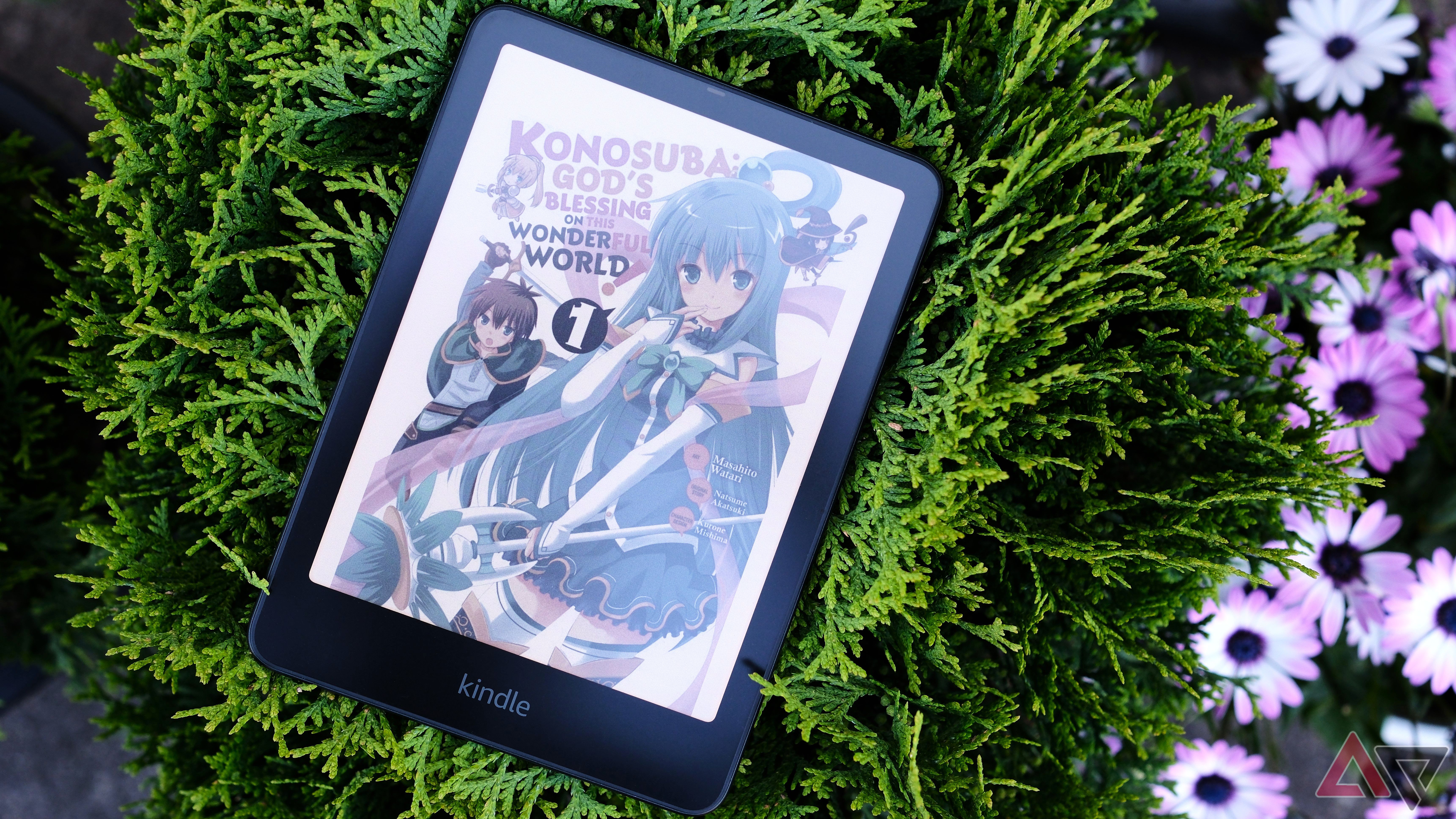 Kindle Colorosft with Konosube manga on screen laying on plant