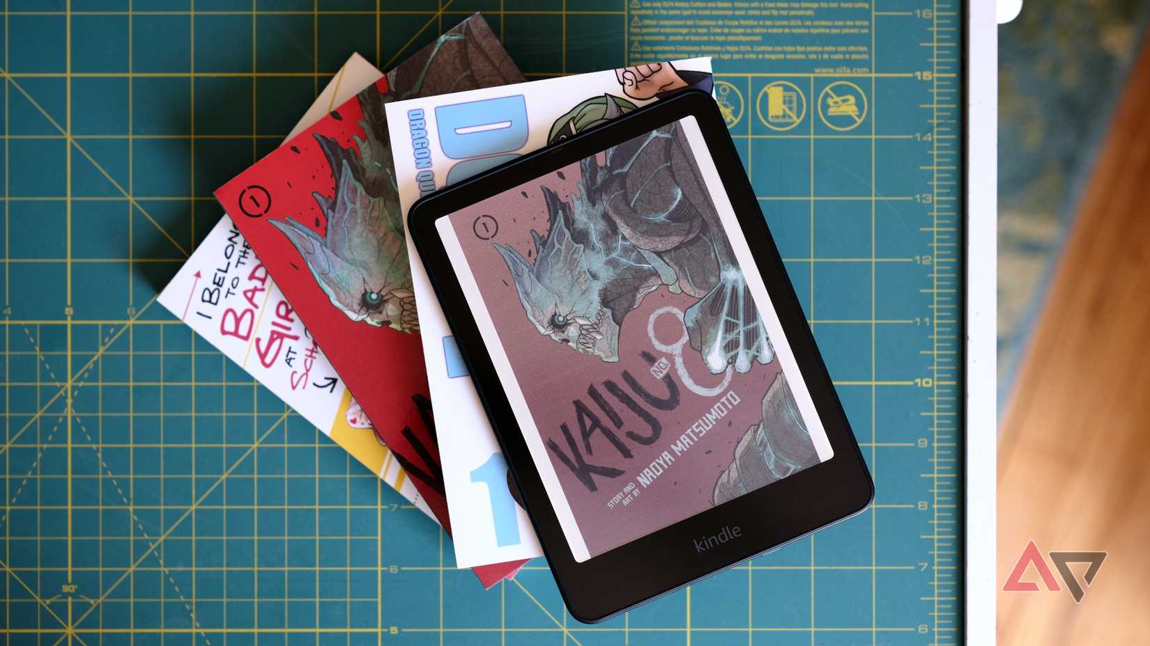 Kindle Colorsoft sits on the manga pile