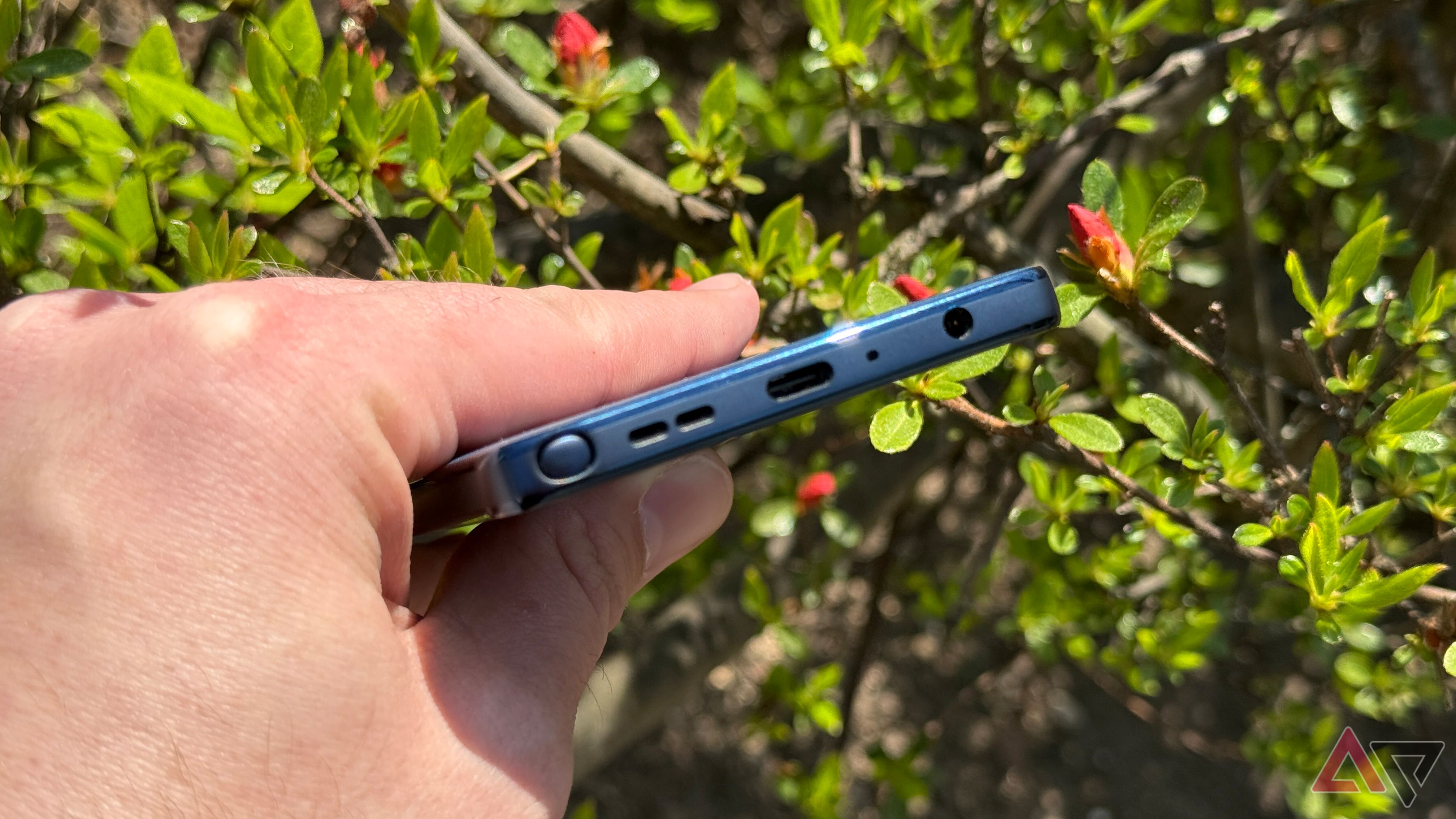 Moto G Stylus (2025) bottom port with greenery in background