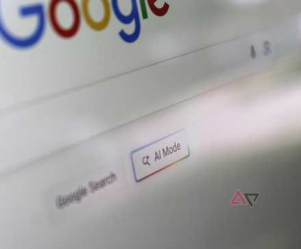 Photo of the AI Mode button on the Google Search home screen, shown on a computer monitor.