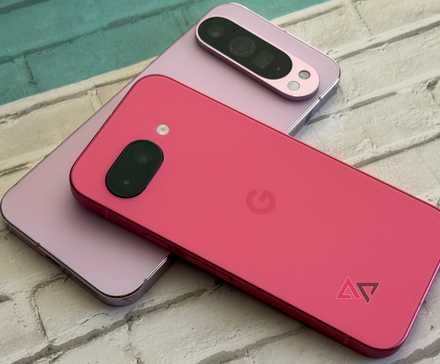 Google Pixel 9a laying on top of a Google Pixel 9 Pro XL