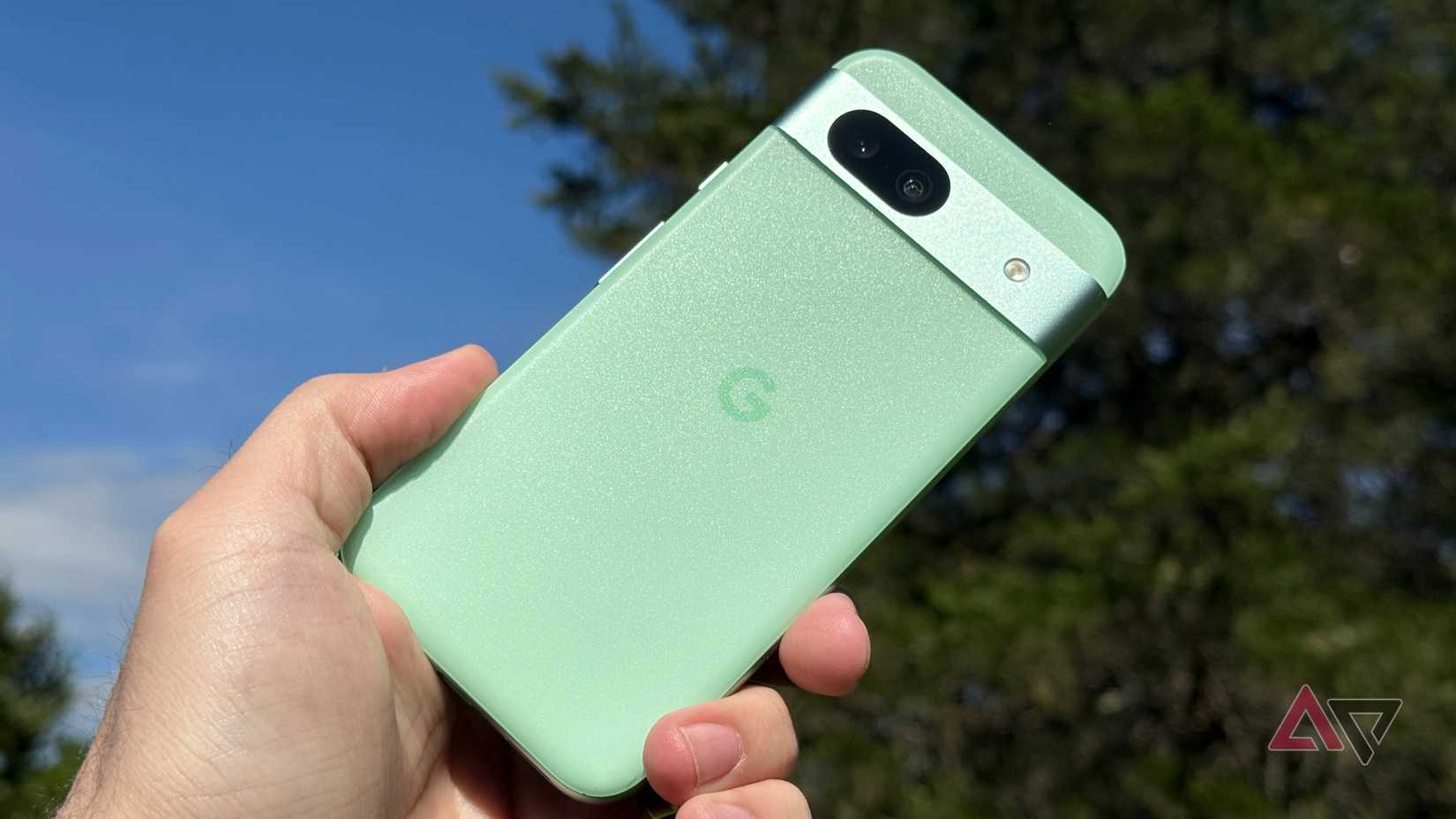Google Pixel 8a against a sunny background