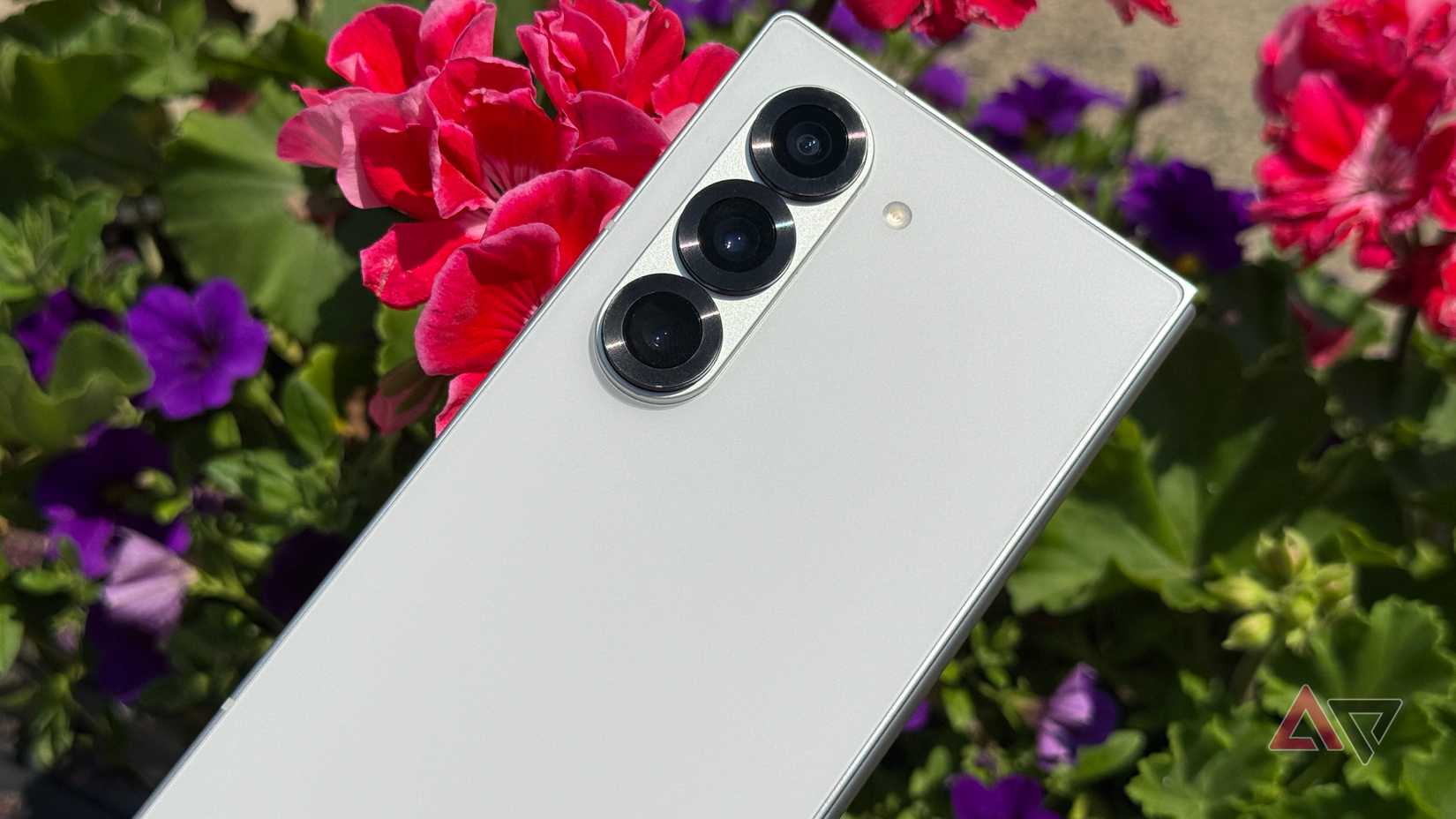 The Samsung Galaxy Z Fold 6 set against some flowers