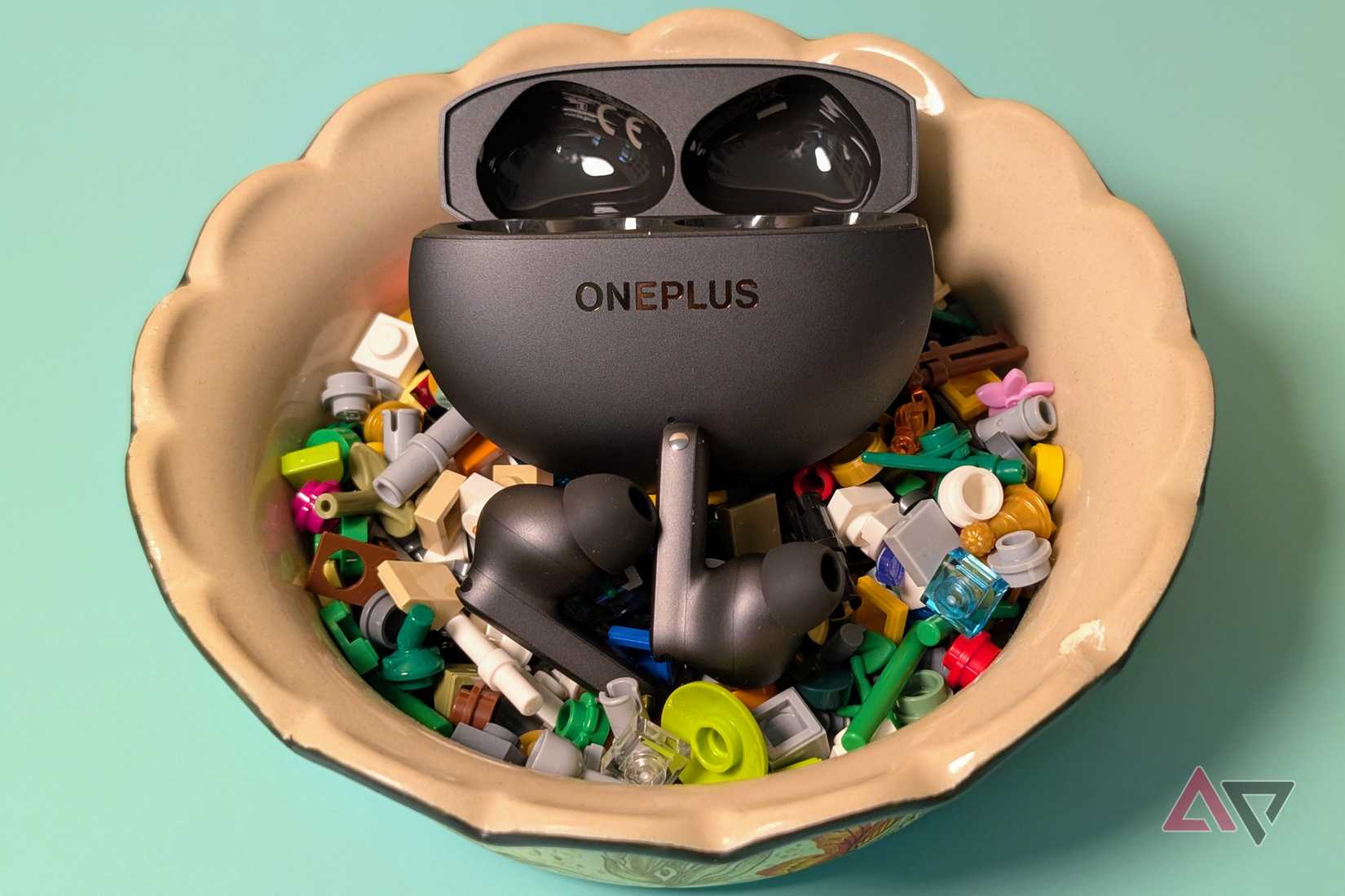 OnePlus Buds 4 in the clay bowl with LEGO