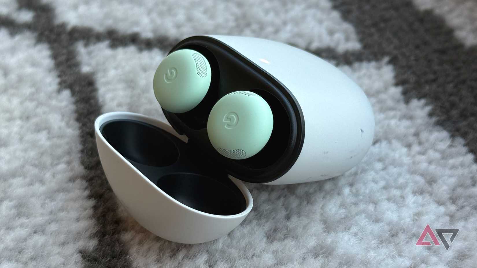 Google Pixel Buds Pro 2 earbuds in the case with lid open
