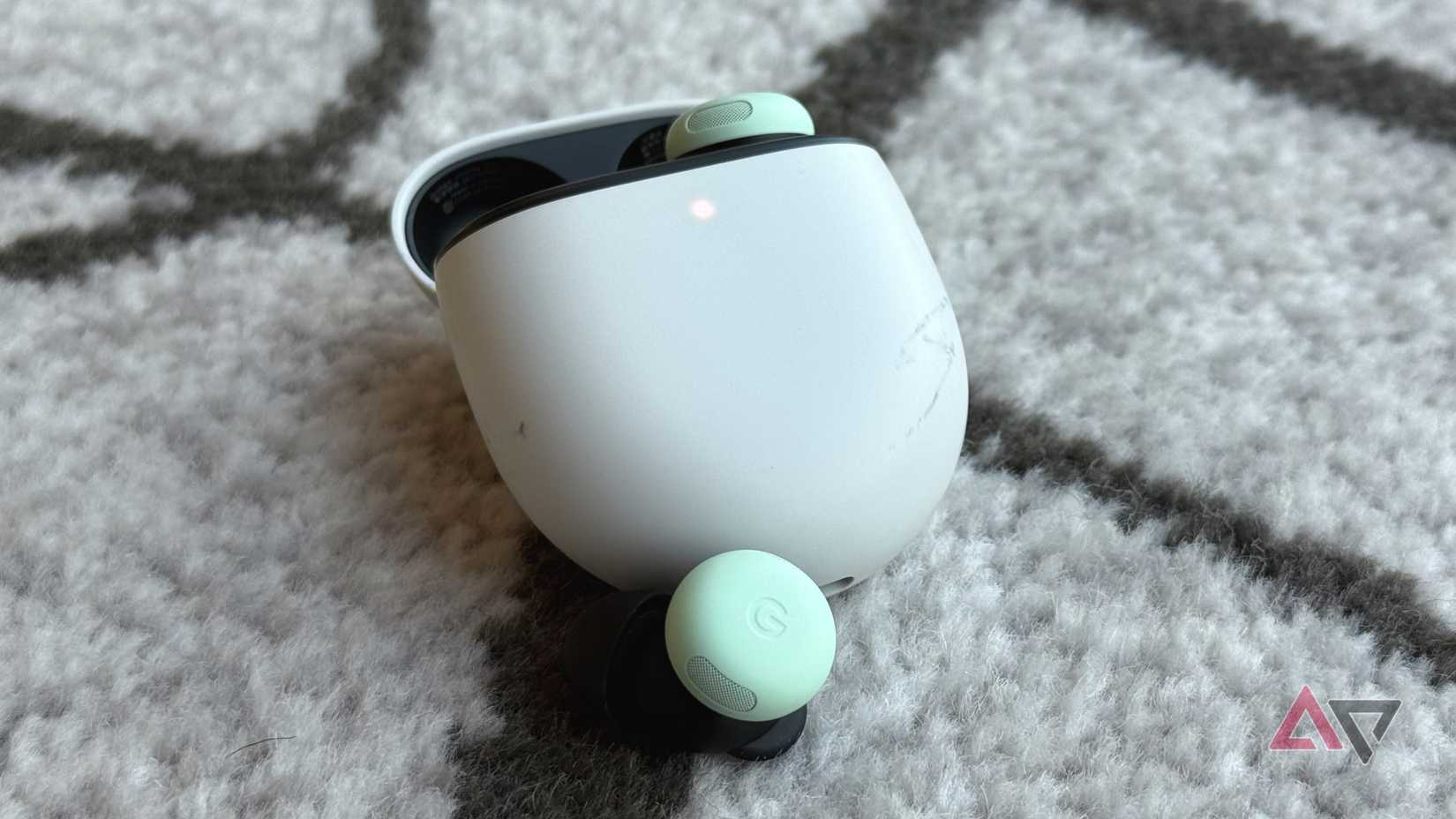 Pixel Buds Pro 2 on a carpeted floor