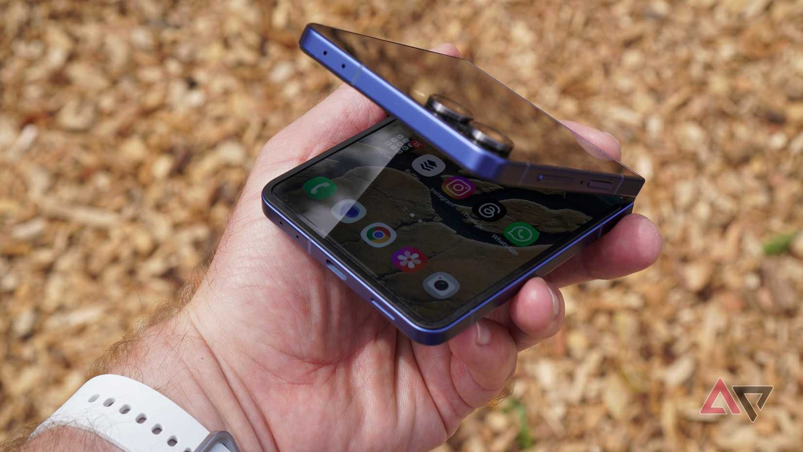 A person opening the Samsung Galaxy Z Flip 7