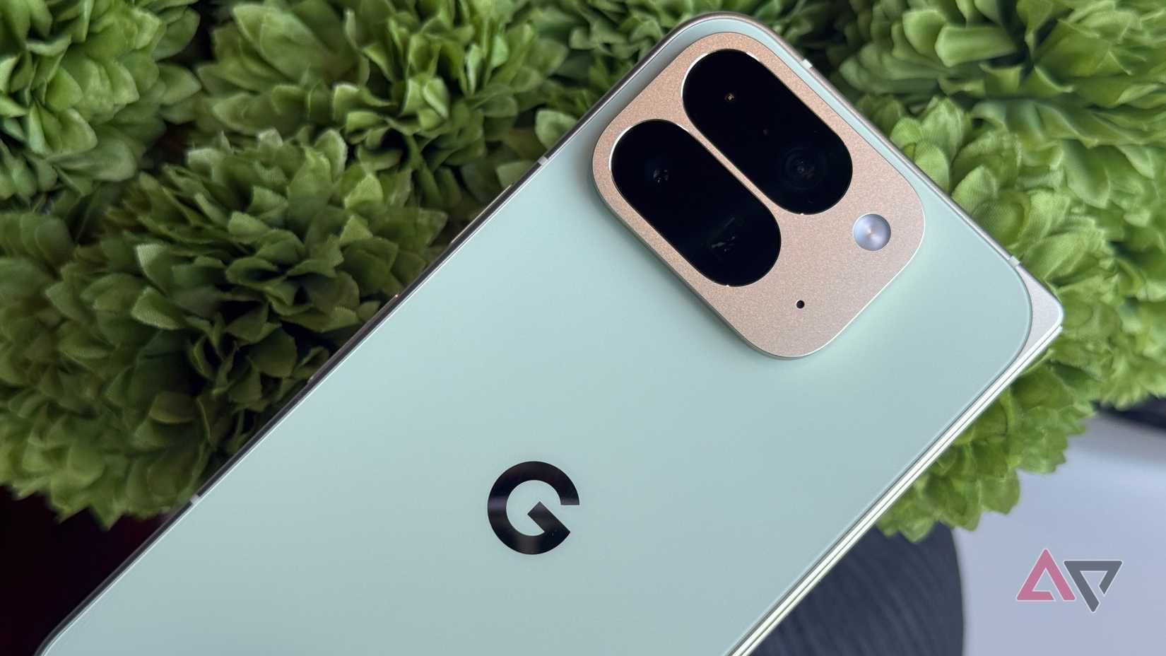 Google Pixel 10 Pro Fold in Jade against green flowers