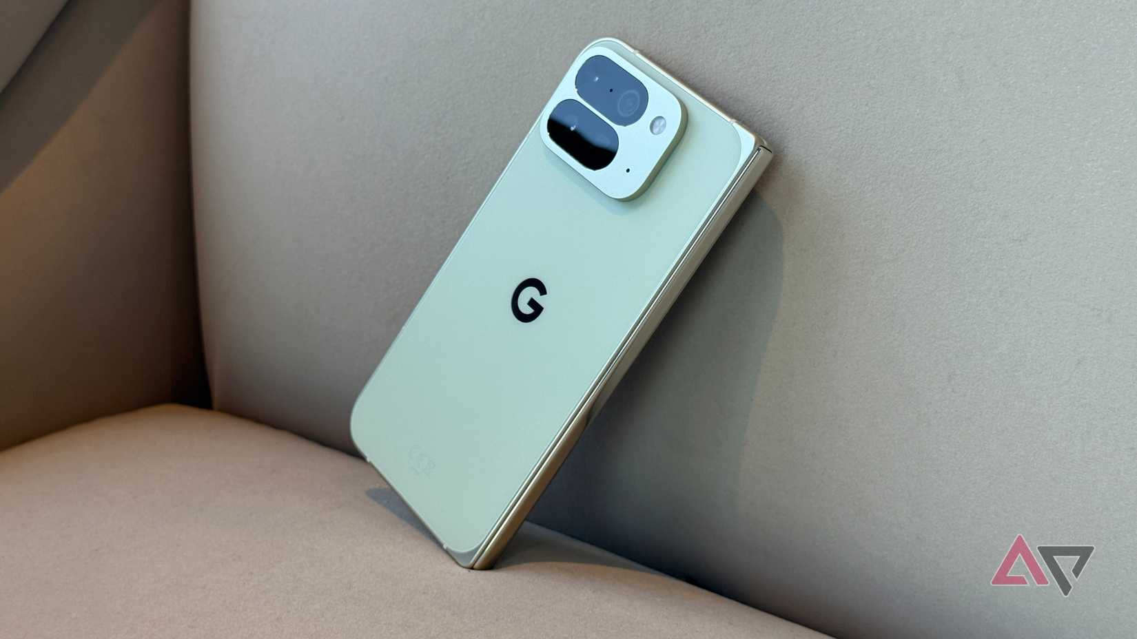 Google Pixel 10 Pro Fold in Jade leaning against a chair