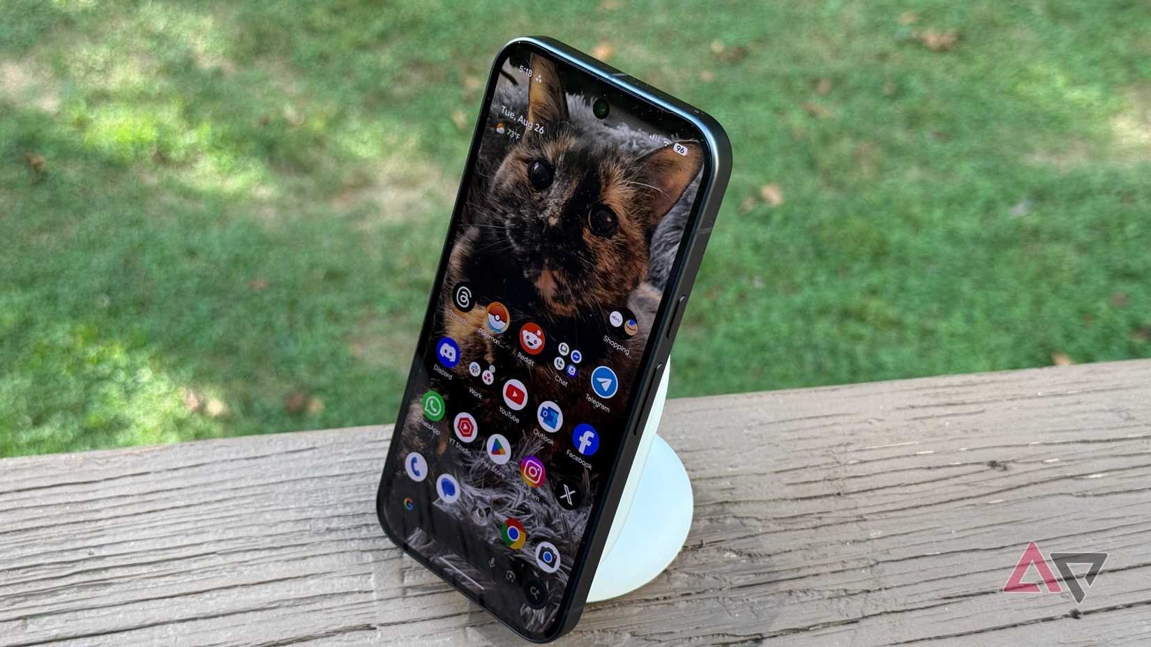 Google Pixel 10 sitting on a Pixelsnap charging stand