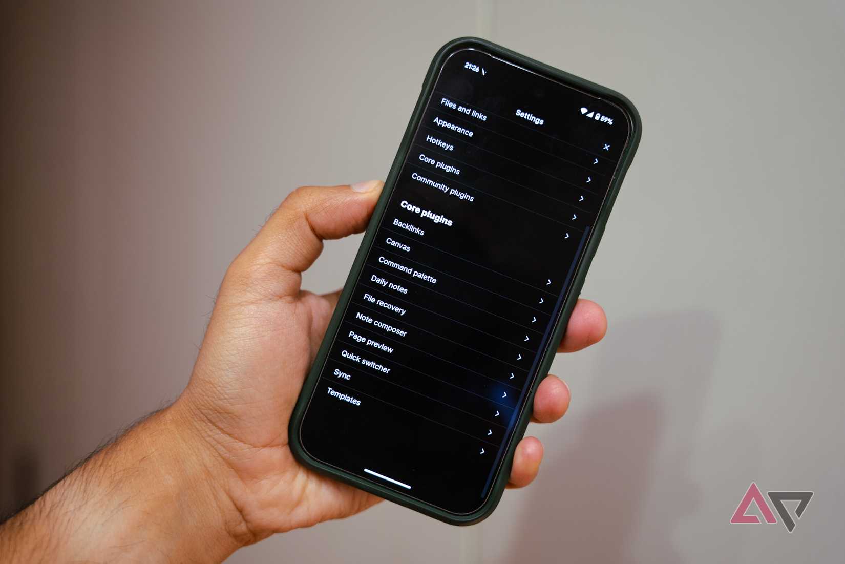 Um telefone mostrando os plugins de núcleo obsidiano