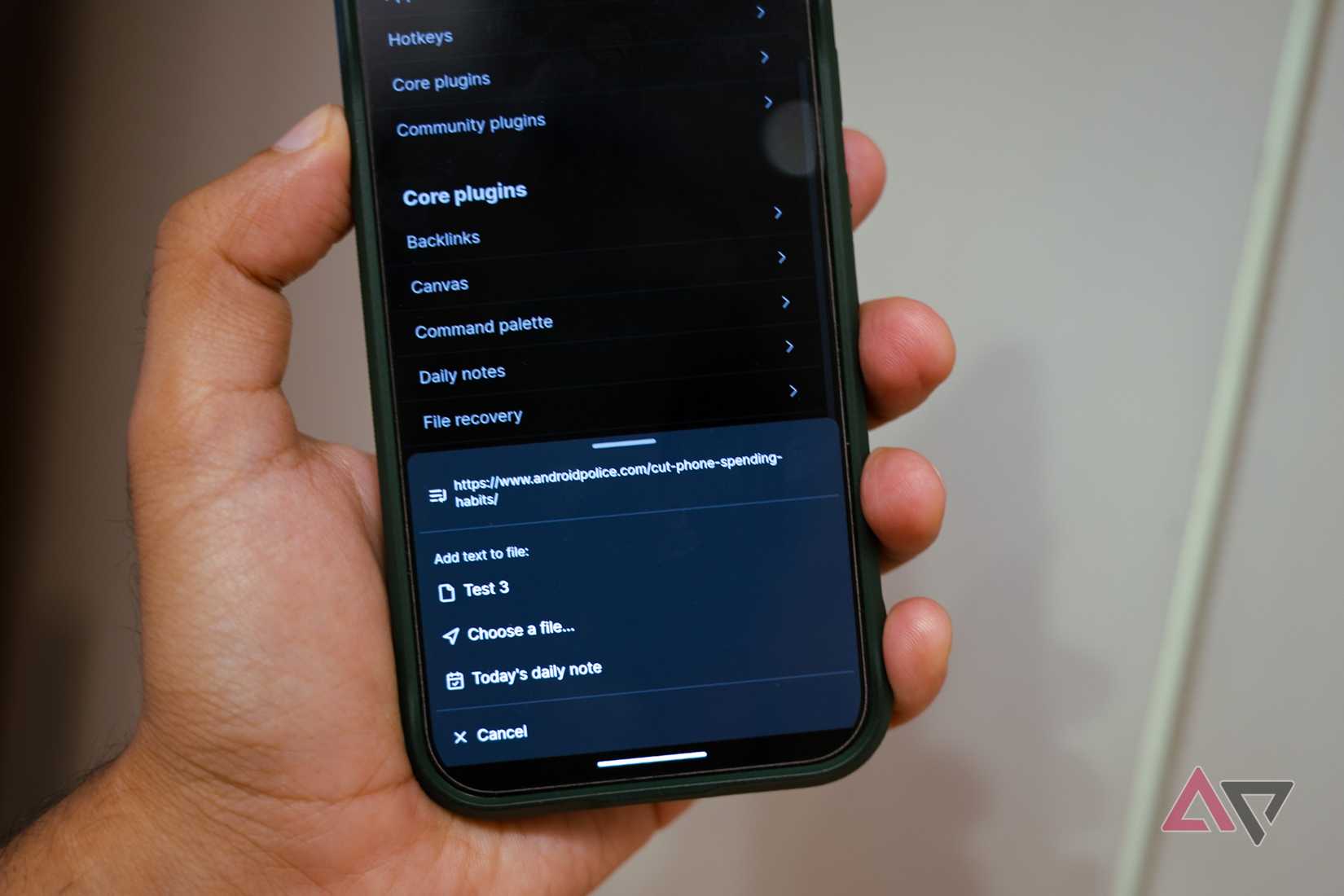 UM telefone Android exibindo a planilha de compartilhamento Obsidian