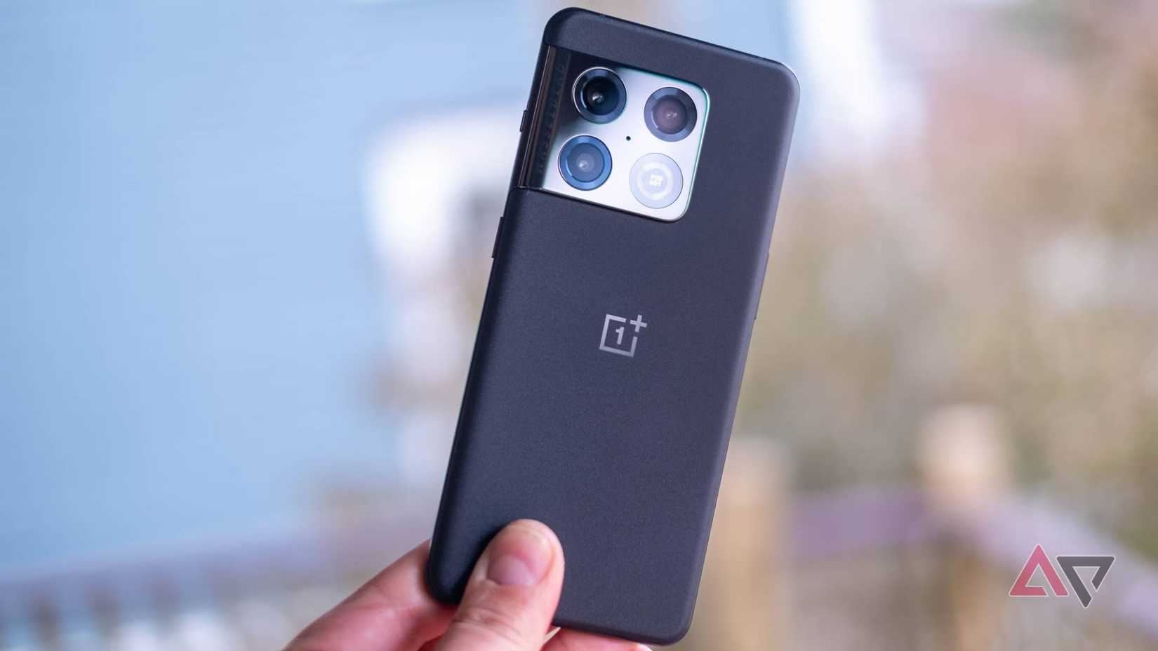 The OnePlus 10 Pro held in a hand.