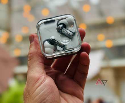 A person holding the Nothing Ear 3 case