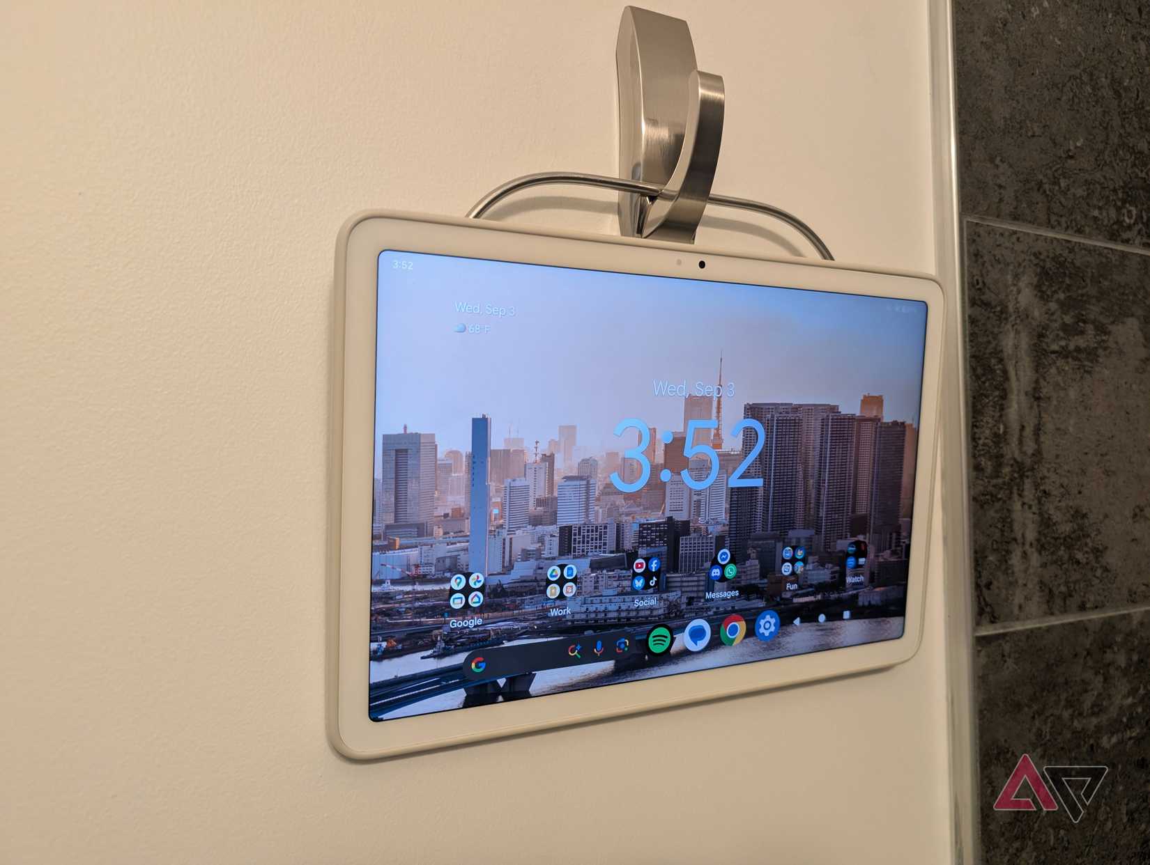 A Pixel Tablet Case hanging on a utility hook.