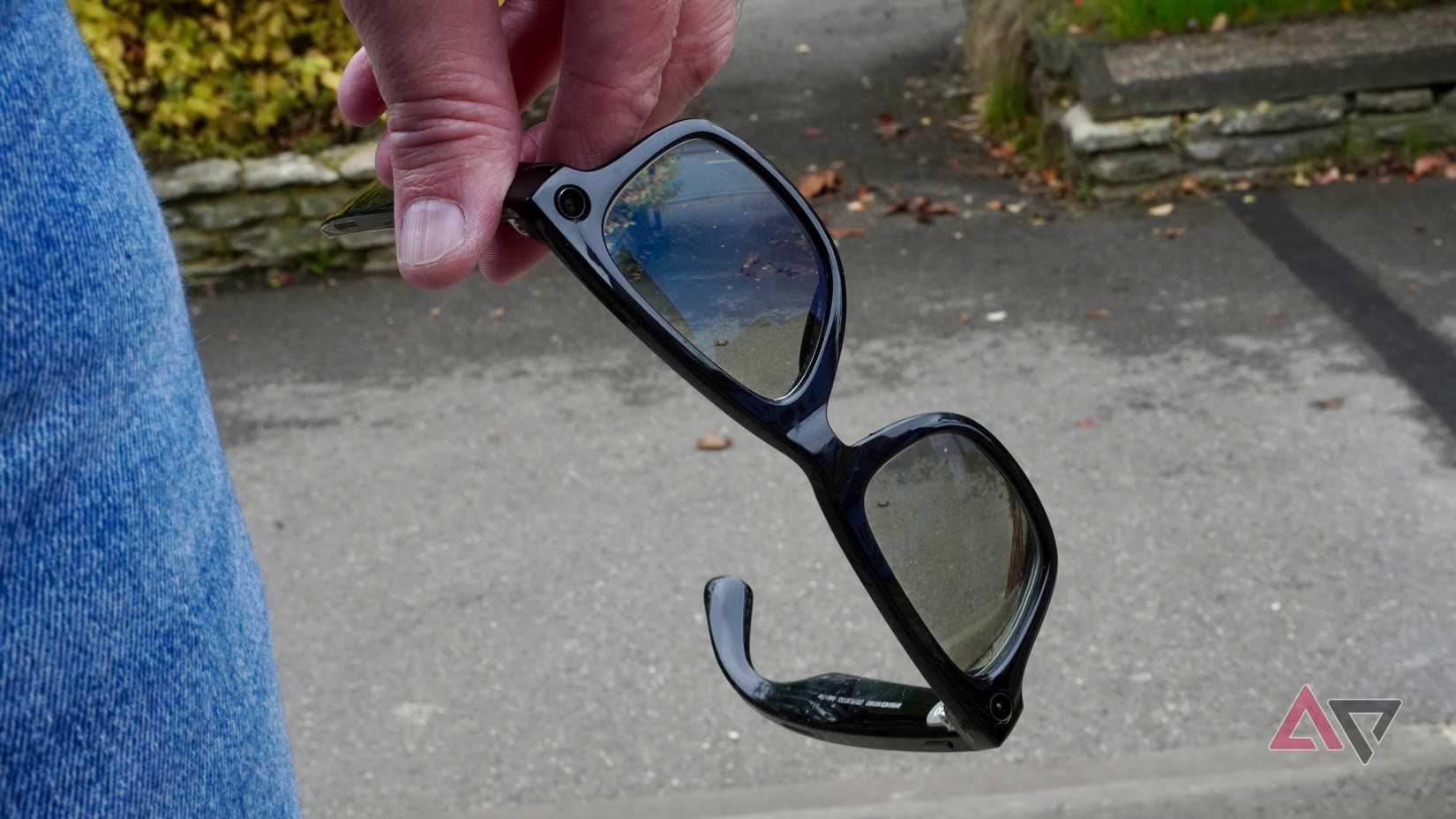 A person holding the Ray-Ban Meta smartglasses