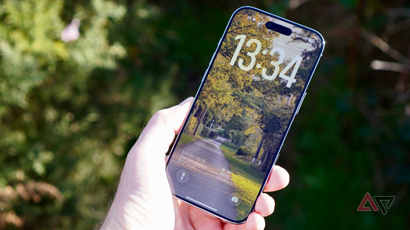 A person holding the Apple iPhone Air