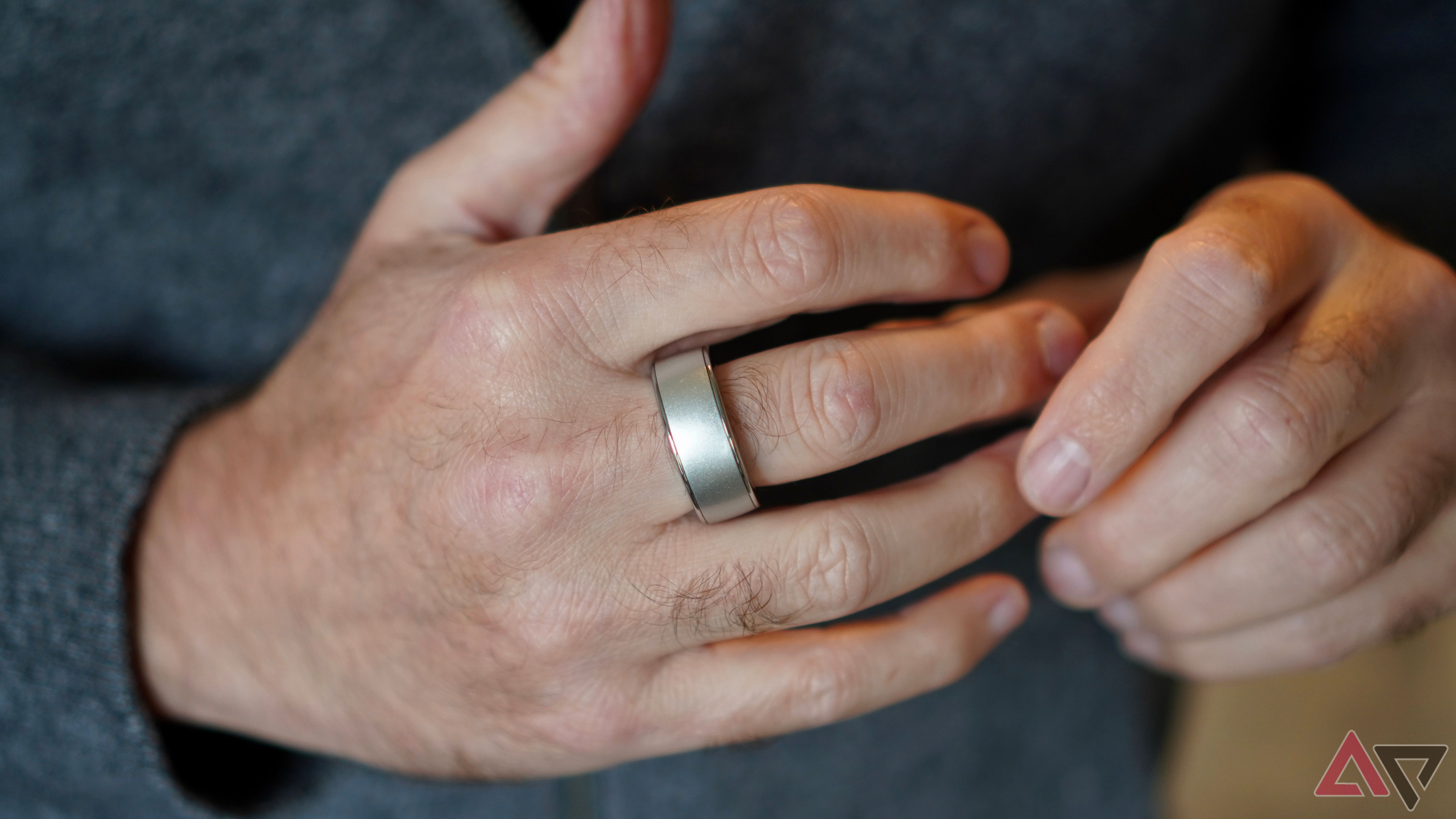 A person wearing the Halliday Glasses's smart ring