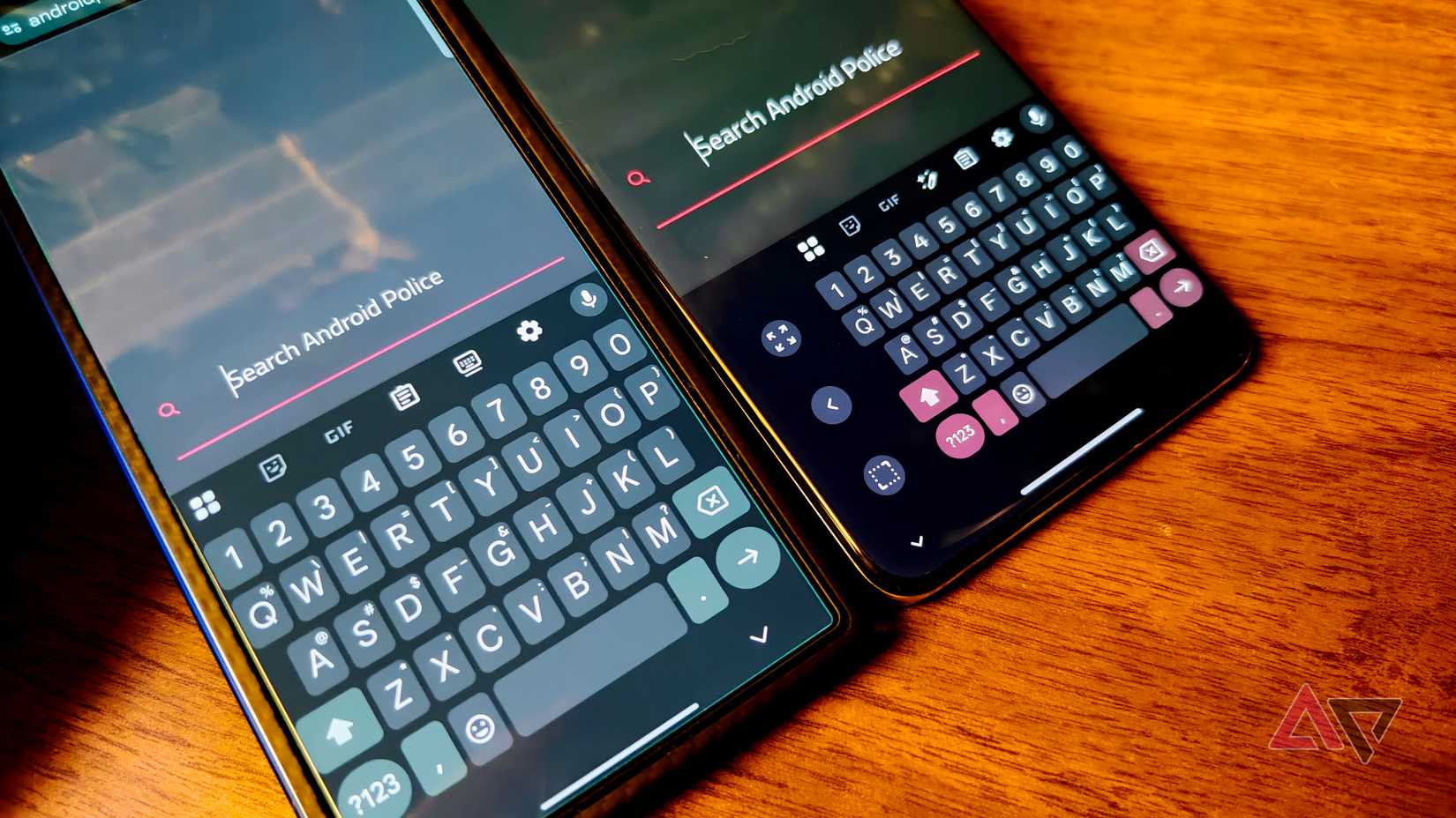 Samsung Galaxy Z Fold 7 and OnePlus 13 on a wooden table showing Gboad full screen and in one-handed mode