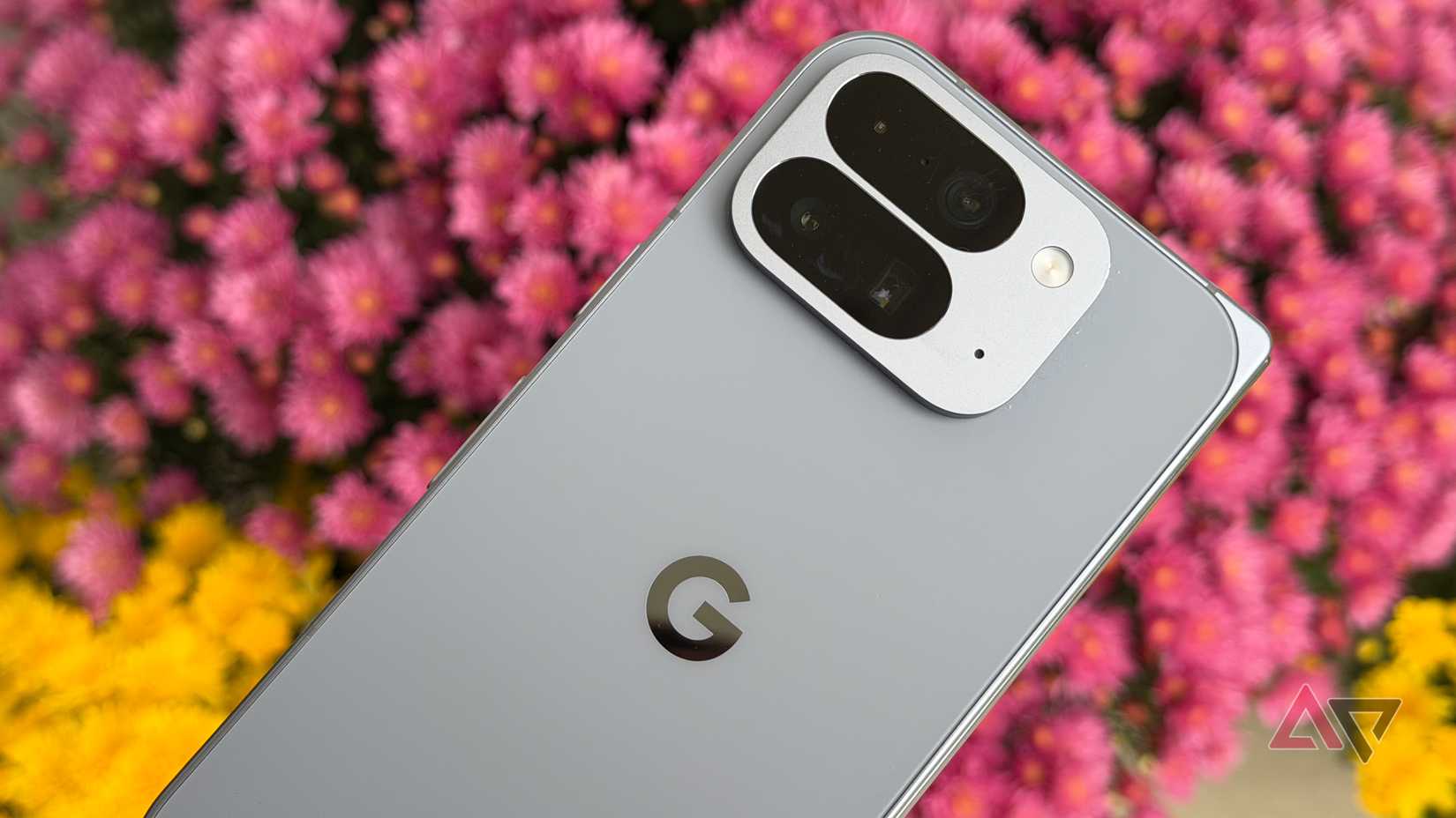Google Pixel 10 Pro Fold against some purple and yellow flowers