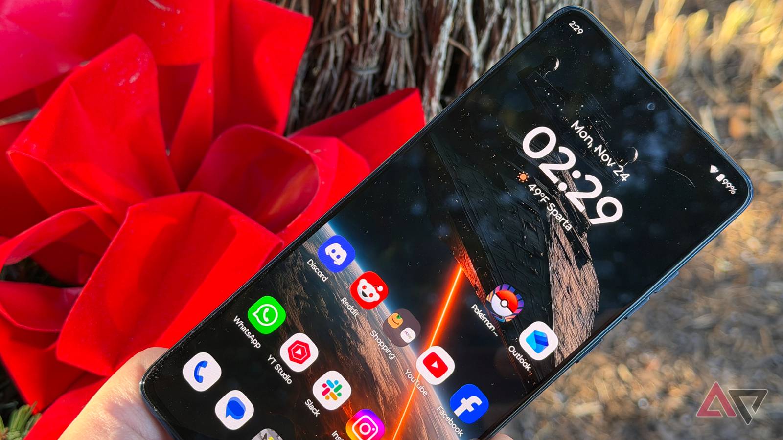 Moto G Stylus 2025 positioned next to a red bow