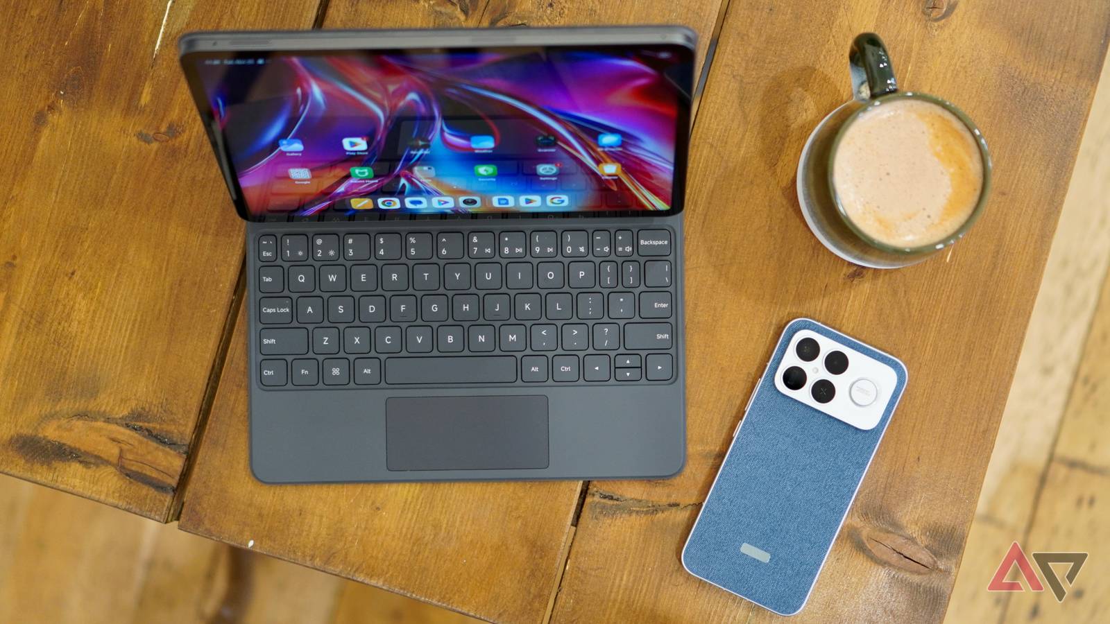 The Poco Pad X1 with Floating Keyboard next to a Poco F8 Ultra