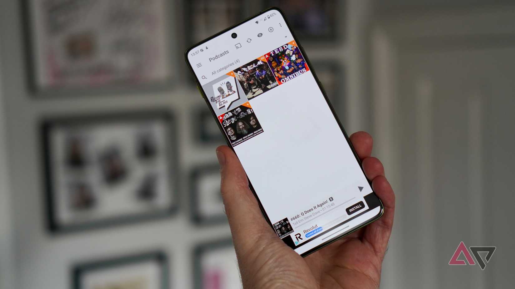 The Podcast Addict app on an Android phone