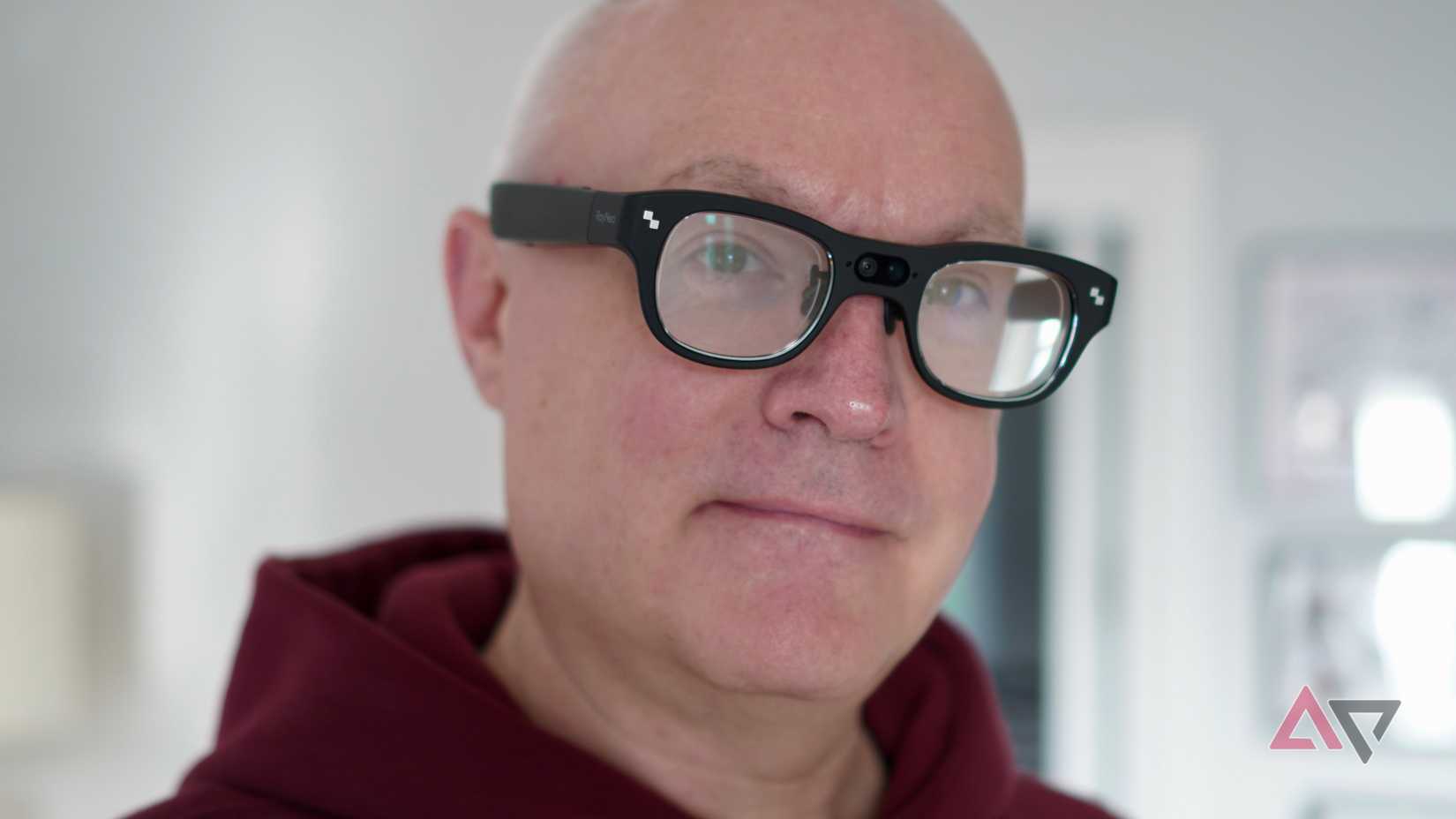 A person holding the RayNeo X3 Pro