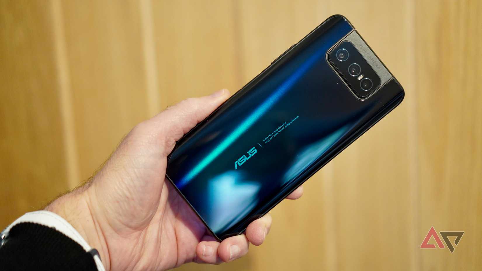 A person holding the Asus Zenfone 7 Pro