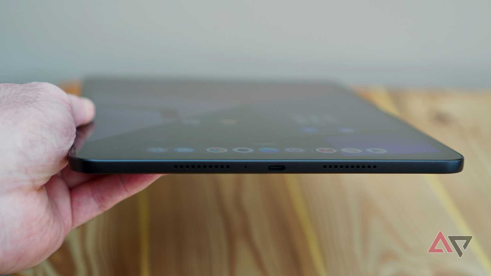 A person holding the OnePlus Pad Go 2