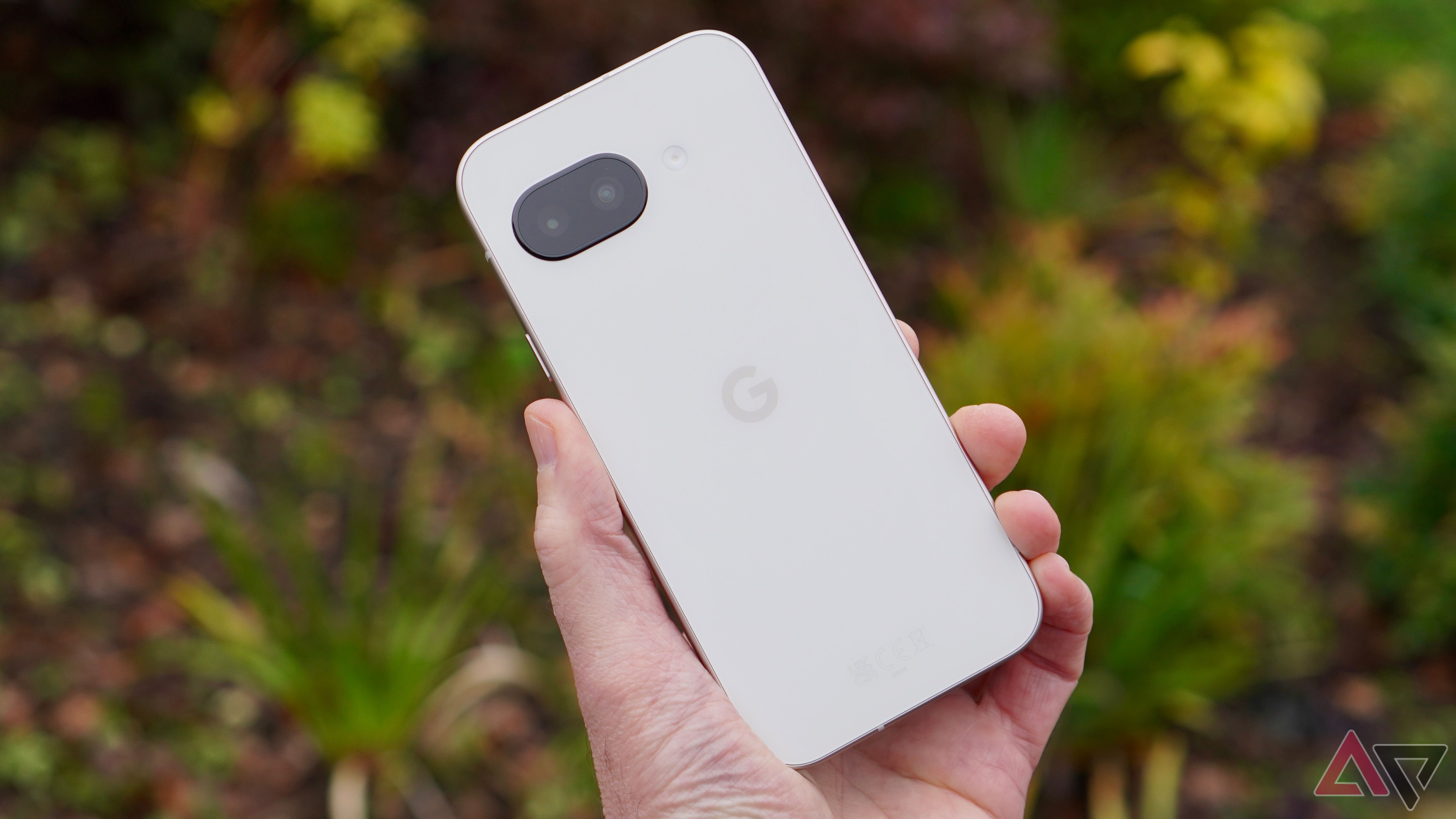 A person holding the Google Pixel 9a