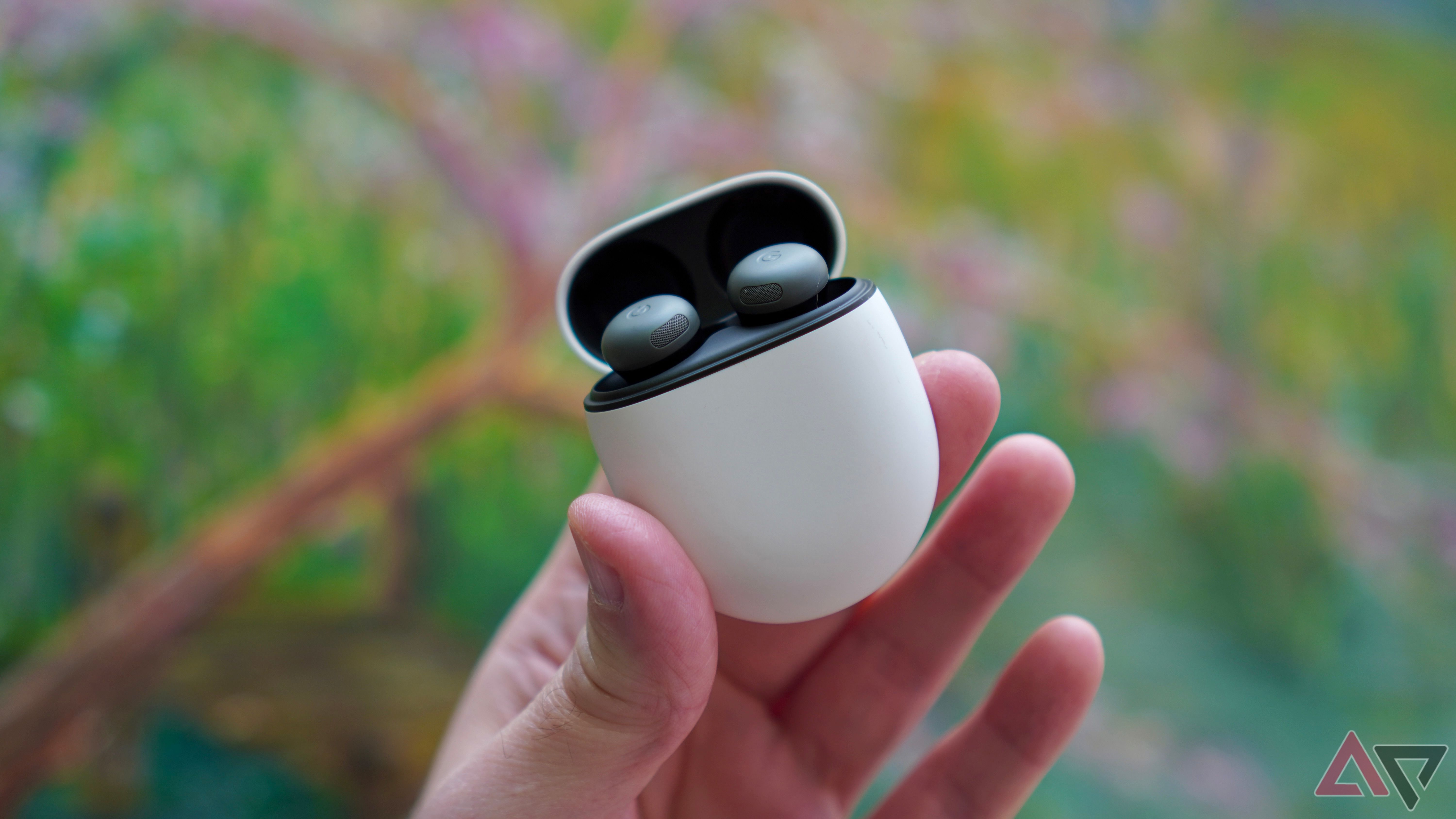 A person holding the Google Pixel Buds Pro 2