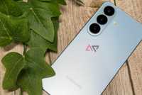 Samsung Galaxy S26 in Sky Blue with a plant
